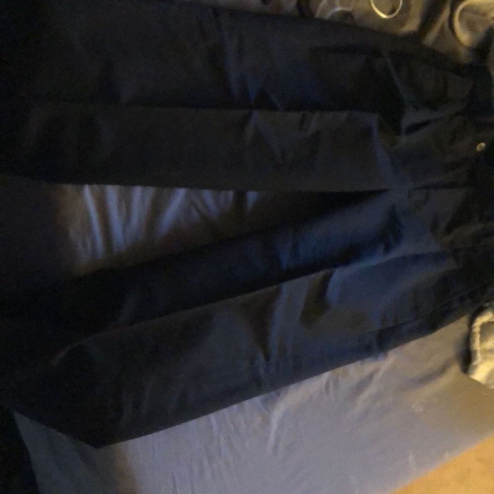 Men’s black slacks